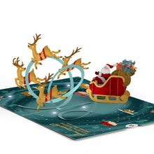 Load image into Gallery viewer, Magic of Christmas Santa's Sleigh Light-Up Lovepop card