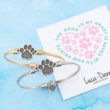 Load image into Gallery viewer, Luca+ Danni Pawprint Bangle Bracelet - Petite/Silver Tone