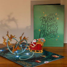 Load image into Gallery viewer, Magic of Christmas Santa&#39;s Sleigh Light-Up Lovepop card
