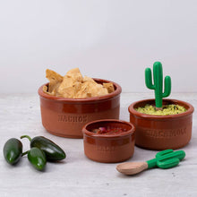 Load image into Gallery viewer, Set of terracotta bowls with cactus-themed handles for nachos, salsa, and guacamole on a light background.
