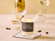 Load image into Gallery viewer, Candle labeled 'Espresso Martini' on a table with glasses and coffee beans.
